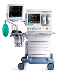 The image shows a Mindray A7 Anesthesia Machine with a green peripheral device, a digital display, and various control buttons and tubes typical of medical equipment used in an operating room setting.